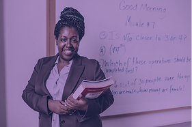 Female teacher purple backdrop